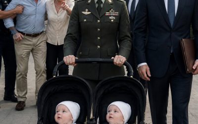 While carrying our twins, I stayed silent as the community credited my husband’s mistress with saving his parents’ property. Days later, he served me divorce papers in the hospital, calling me worthless and leaving without realizing my true rank as a U.S. Army colonel. He thought he had won, until I showed up again with a military escort, senior officers, and law enforcement standing behind me.